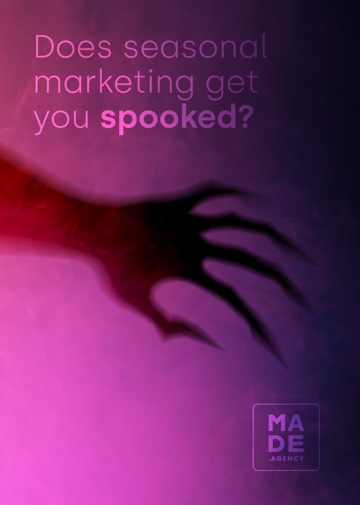 Spooky Halloween-themed design with a shadowy hand reaching through pink and purple smoke, featuring the text ‘Does seasonal marketing get you spooked?’ and the MADE Agency logo.