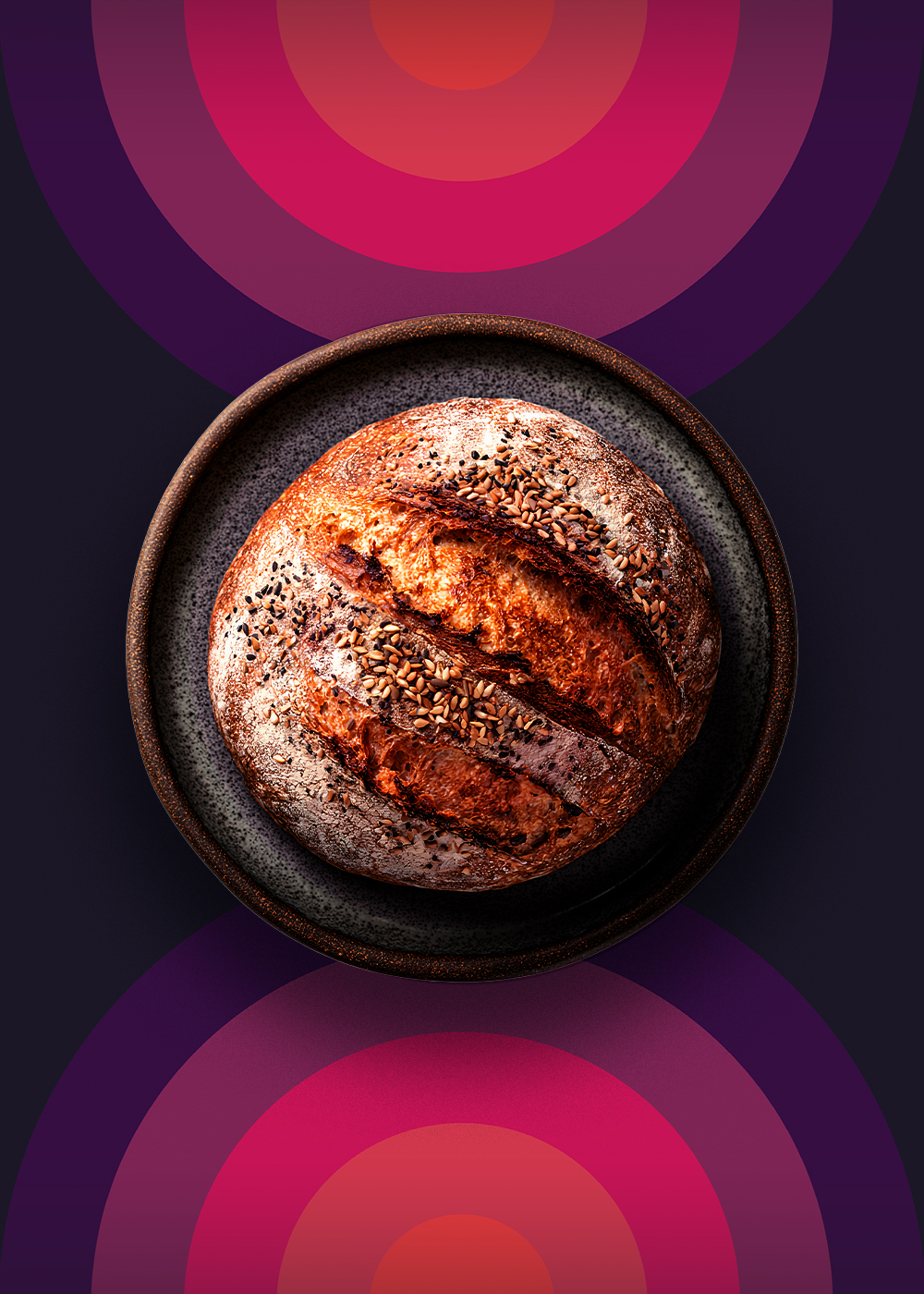 Sitting in the centre of a patterned background sits a crusty sourdough loaf that has obviously been backed with time and care. It's an example of the quiet luxury that sits at the heart of the blog